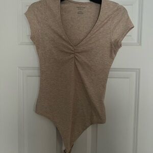 American Eagle Outfitters Cream V-Neck Cap Sleeve Bodysuit